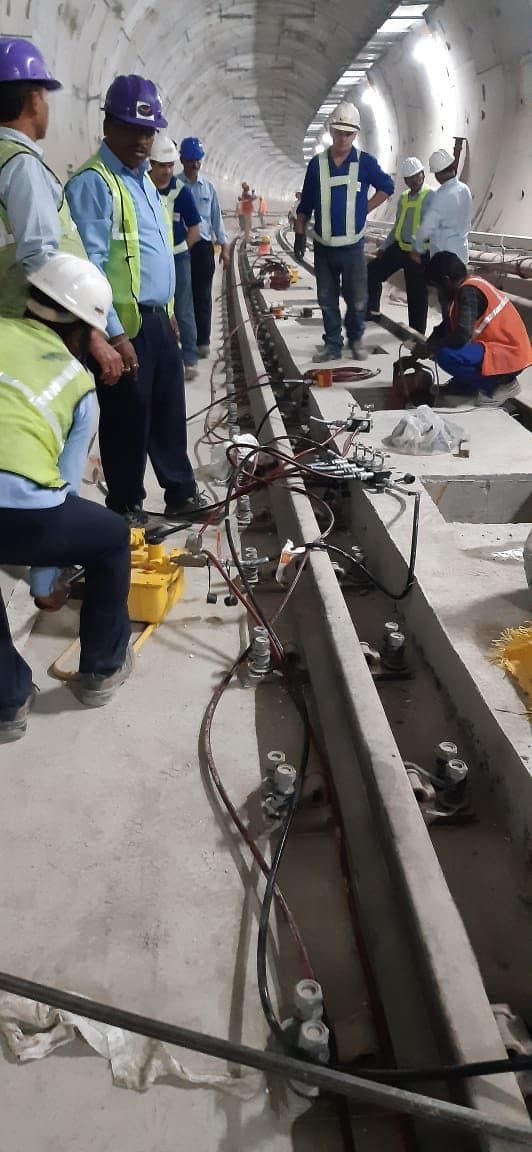 Track team working in an underground metro tunnel
